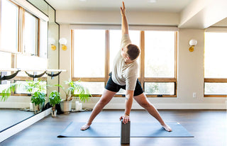 Prasarita Padottanasana (Wide-Legged Forward Bend) with Big Foam Yoga Block - Gray