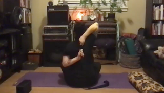 Black Yoga Strap in Gomukhasana