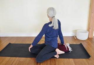 Woman in Bharadvajasana (Sage’s Twist) Yoga Pose on Para Rubber Mat - Storm