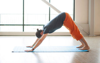 Man in Downward Facing Dog on Eco-Rich Mat - Bluebird