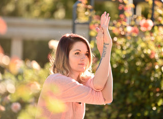 Woman in Garudasana Arms (Eagle Arms)