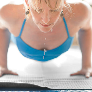 Woman Sweating in Hot Yoga