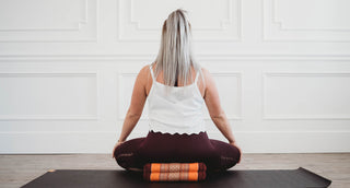 Woman Sitting Cross-legged on Zafuko Yoga & Meditation Cushion