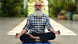 Man Seated in Half Lotus Pose