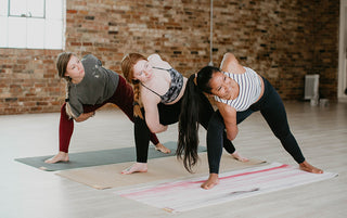 Baddha Parsvakonasana (Bound Side Angle Pose) on Nature Collection Pink Jasper Sattva Jute and Earth Elements 3mm Mat