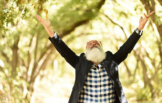Man Reaching Toward Sky