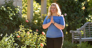 Woman Standing with Hands in Anjali Mudra