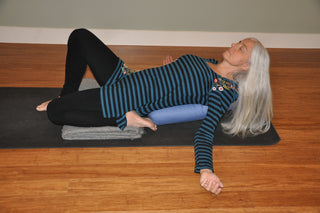 Woman in Supta Virasana