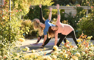 Women in Trikonasana (Triangle Pose) on Para Rubber Mats