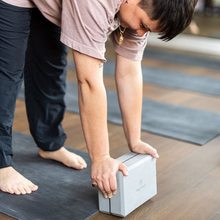 Uttanasana (Forward Fold) with 4 in. Foam Yoga Block - Gray