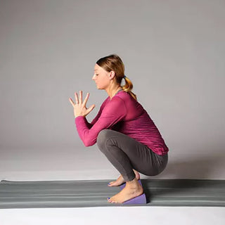 Malasana (Garland Pose) with Foam Yoga Wedge - Purple