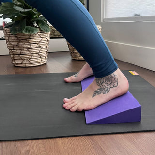Adho Mukha Svanasana (Downward Facing Dog) with Foam Yoga Wedge - Purple