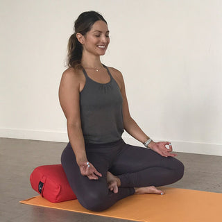 Woman Sitting on Junior Yoga Bolster - Poppy