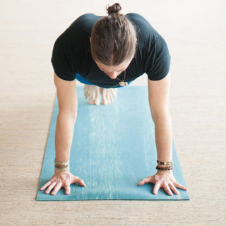 Man in Phalakasana (Plank Pose) on Para Rubber Yoga Mat - River
