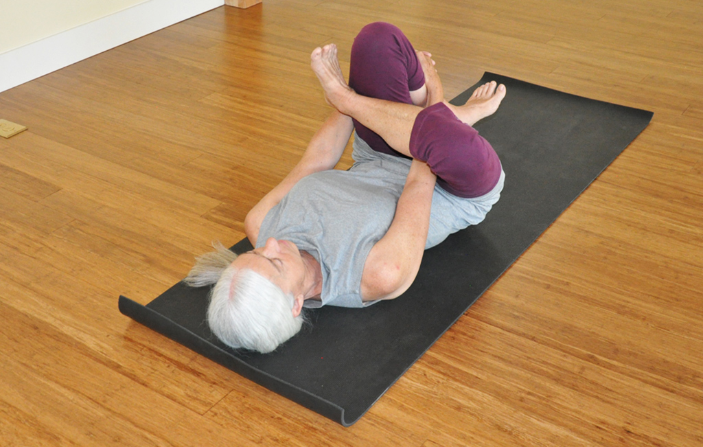 Supta Ardha Padmasana