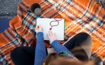 Woman Writing in Journal