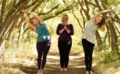 Women Standing in Tree Tunnel
