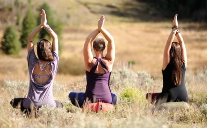 Women Sitting on Meditation Cushions