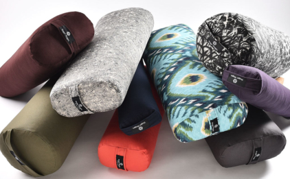 Stack of Various Yoga Bolsters