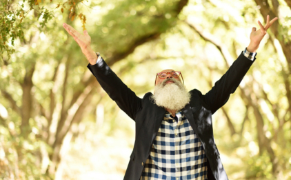 Man Reaching Toward Sky