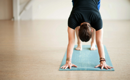 Man in Adho Mukha Svanasana (Downward Facing Dog) on Para Rubber Mat - River