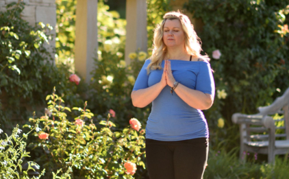 Woman Standing with Hands in Anjali Mudra