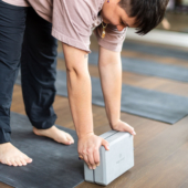 Uttanasana (Forward Fold) with 4 in. Foam Yoga Block - Gray