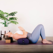 Restorative Matsyasana (Fish Pose) with Plum Standard Bolster and Cork Block