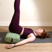 Viparita Karani (Legs Up the Wall/Waterfall Pose) with Standard Yoga Bolster - Green Goddes, Tapas® Ultra Mat - Gray