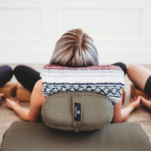 Supta Baddha Konasana on Standard Yoga Bolster - Olive