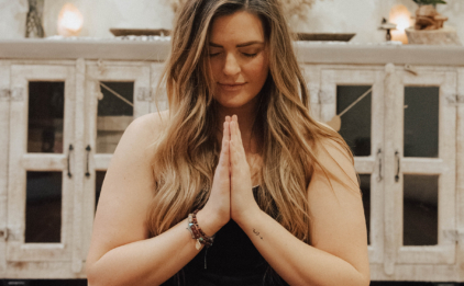 Woman with Hands in Anjali Mudra