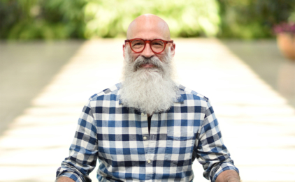 Man with White Beard in Seated Posture