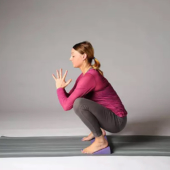Malasana (Garland Pose) with Foam Yoga Wedge - Purple