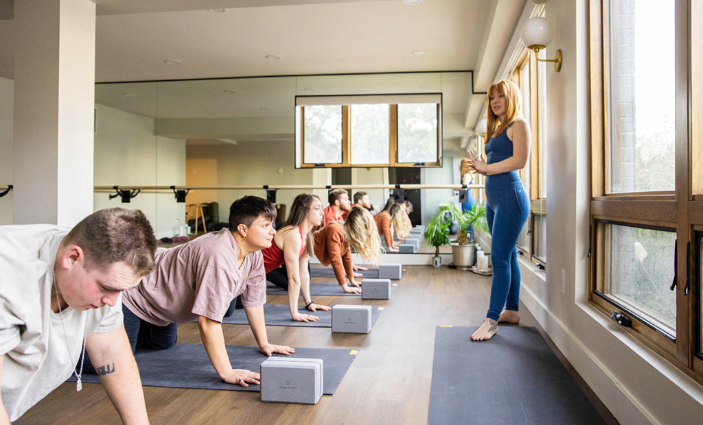 Teacher and Yoga Class